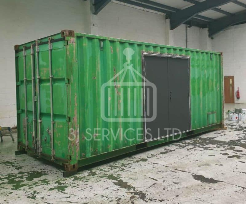 20ft used green container with doors in the side ready to be painted