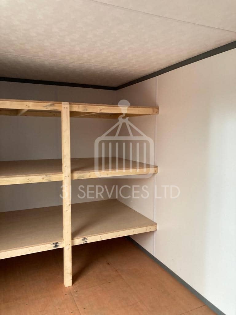 Cladded shelving container