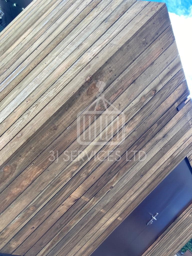 Cladded shelving container