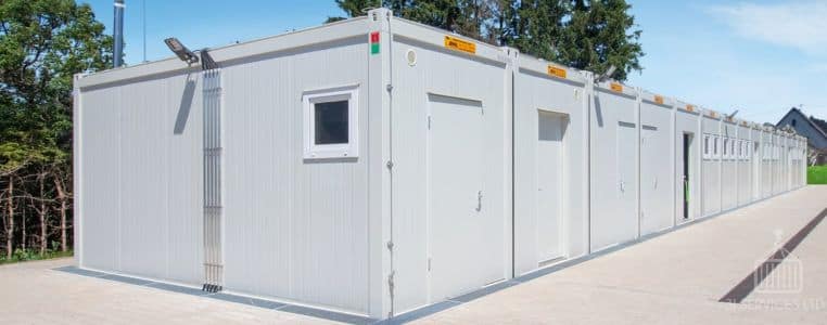 Grey portable offices in a row