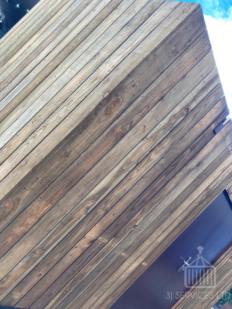 Cladded shelving container