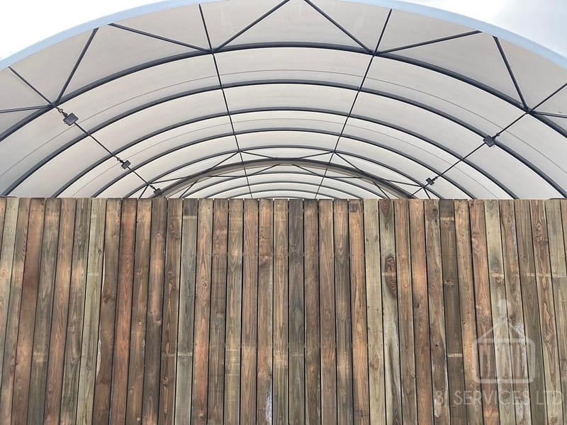 Cladded shelving container