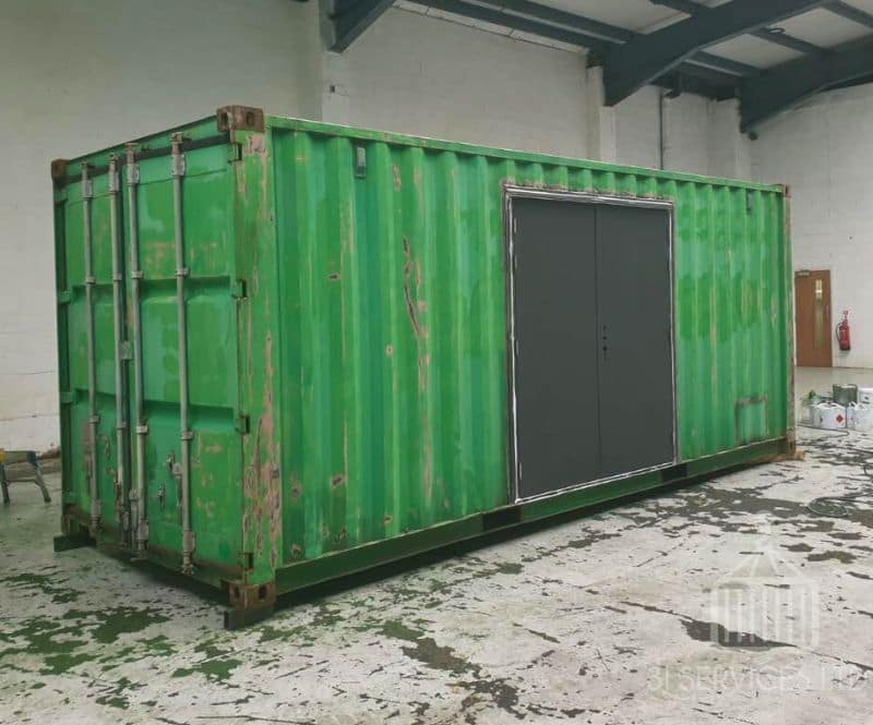 20ft used green container with doors in the side ready to be painted