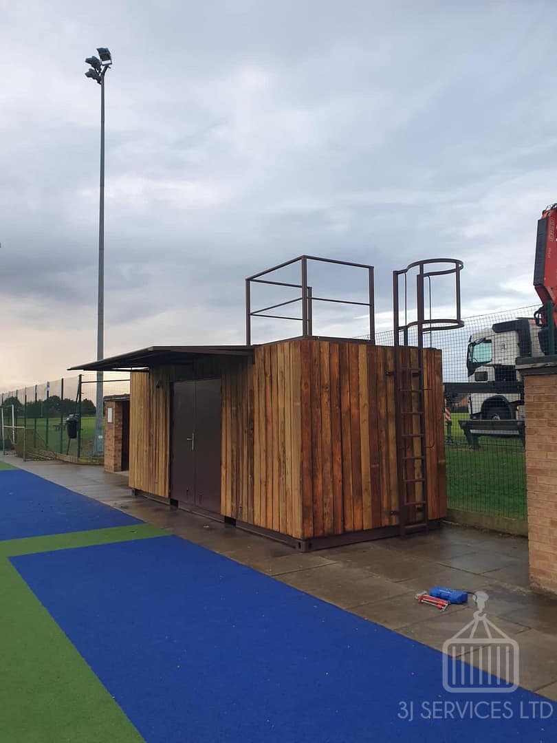 Cladded school container